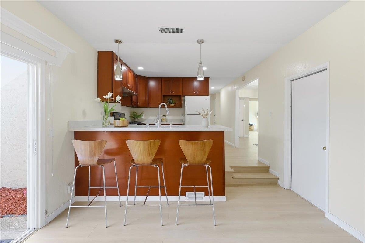 7109 Elba Way Dublin, CA 94568 - Photo 30 of 60 a bathroom with a sink a mirror and a shower