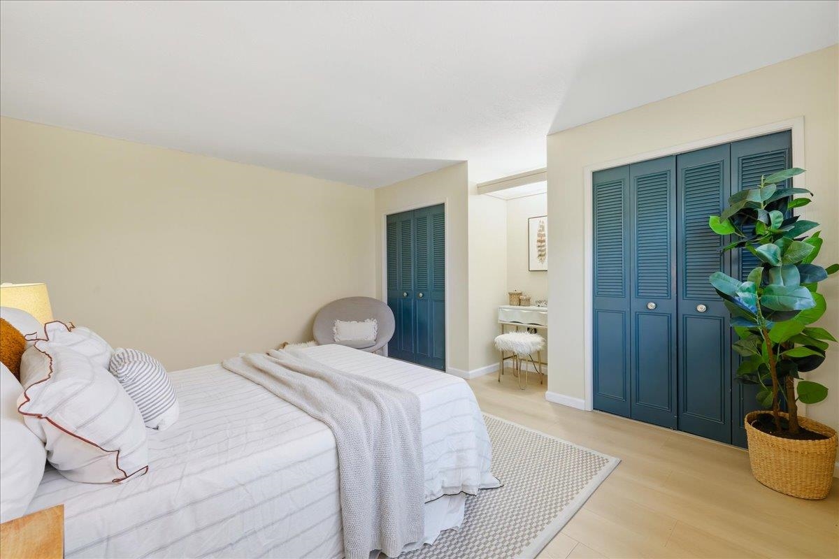 7109 Elba Way Dublin, CA 94568 - Photo 38 of 60 a bedroom with a bed and a potted plant