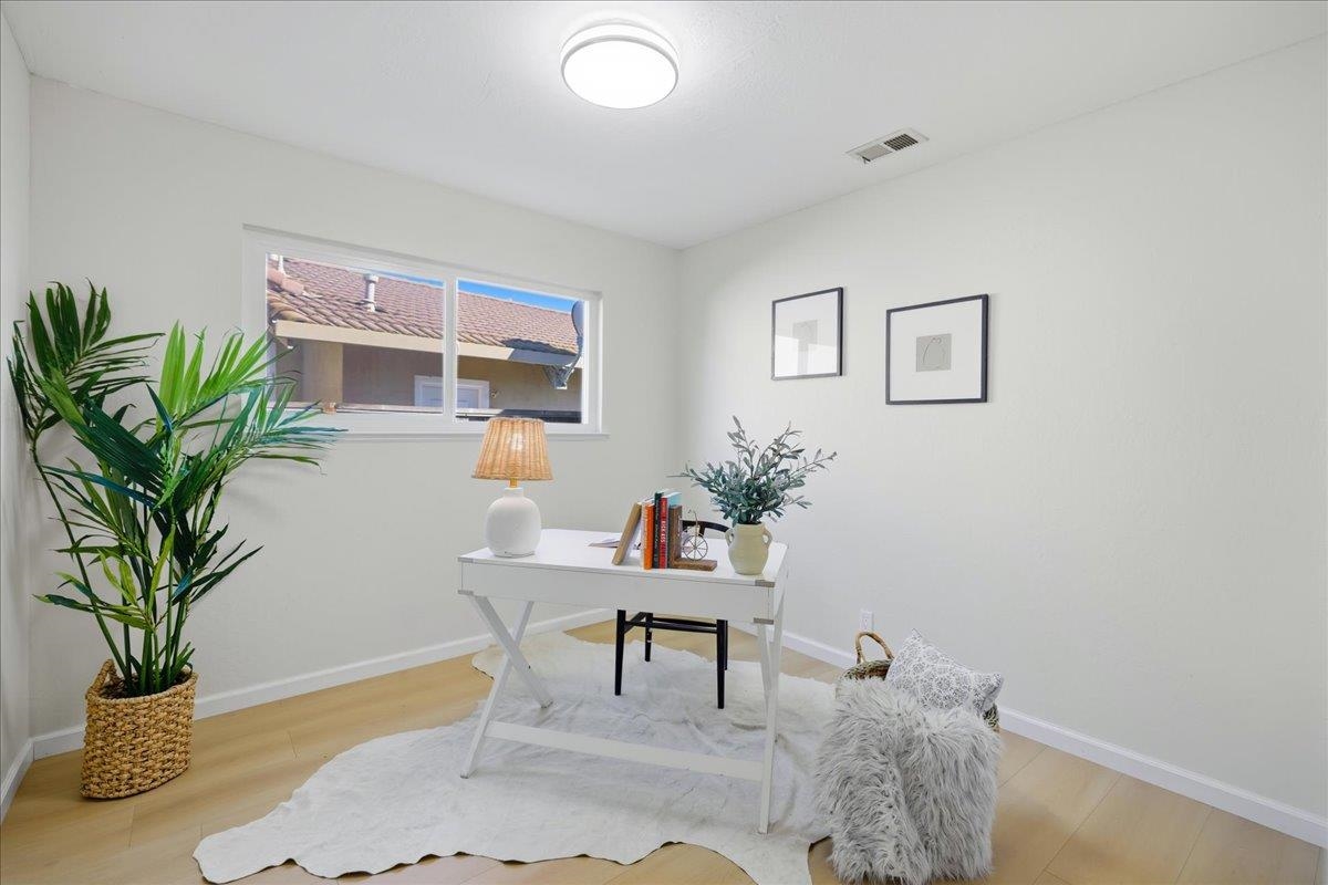 7109 Elba Way Dublin, CA 94568 - Photo 45 of 60 a living room with furniture and a potted plant