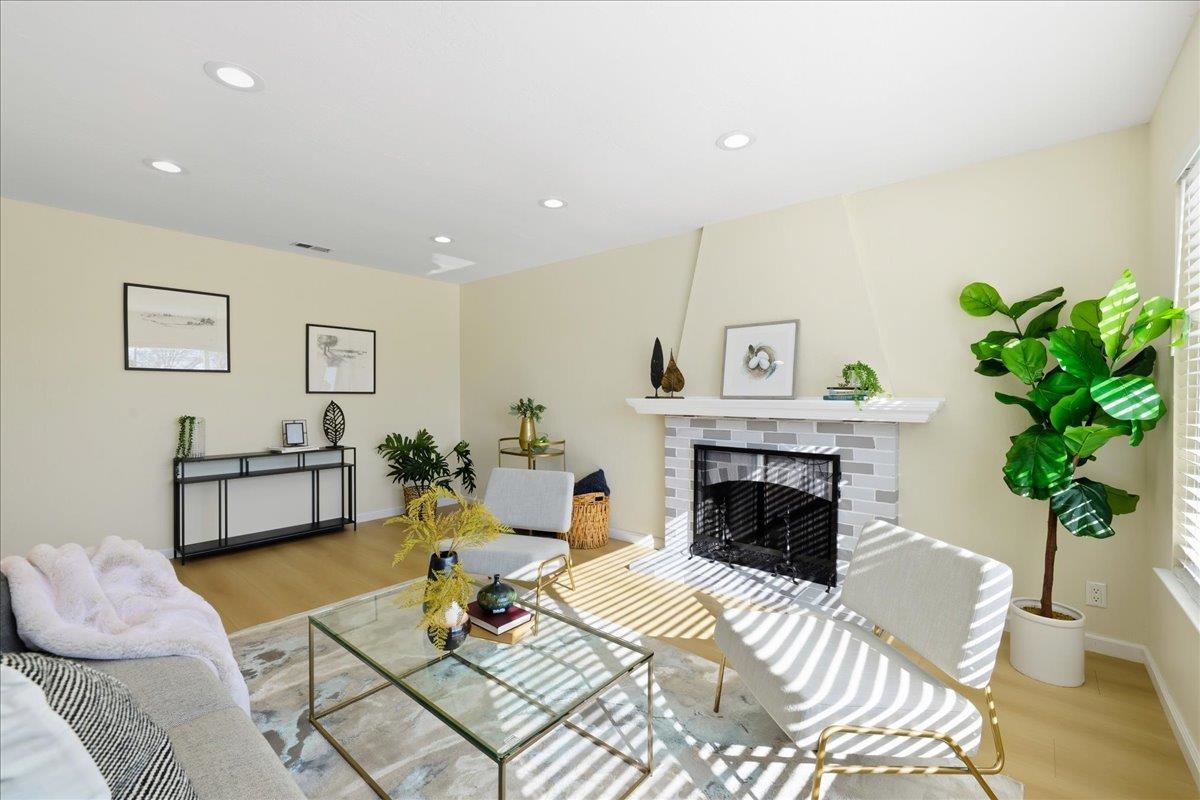 7109 Elba Way Dublin, CA 94568 - Photo 9 of 60 a living room with furniture and a fireplace
