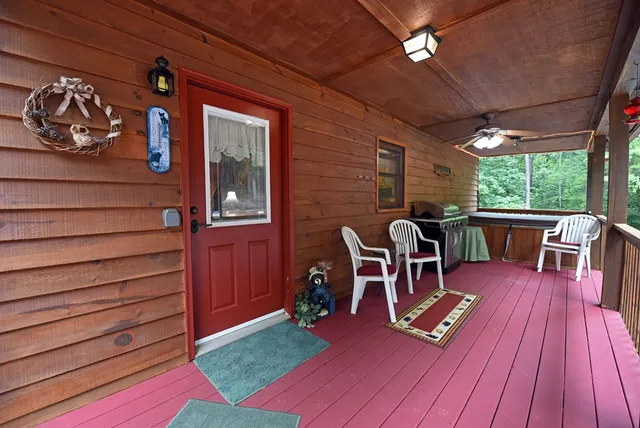 a view of deck with wooden floor and outdoor seating