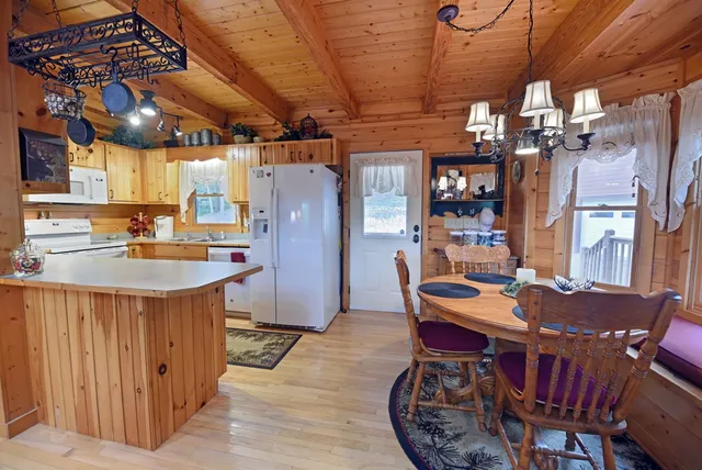 a view of a balcony with furniture