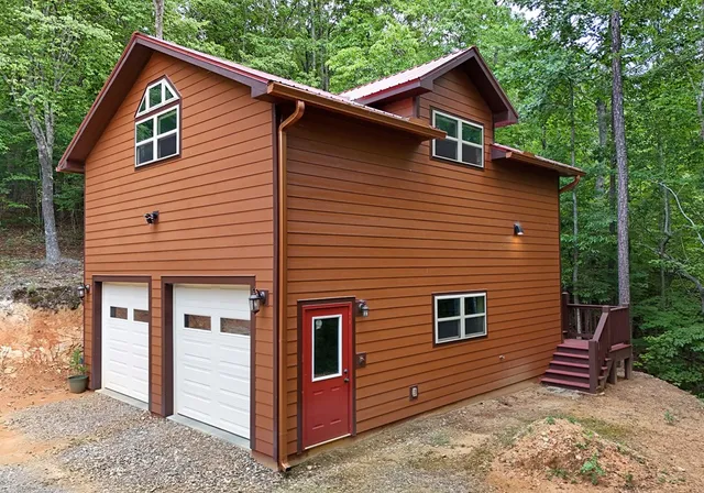 a front view of a house with garden