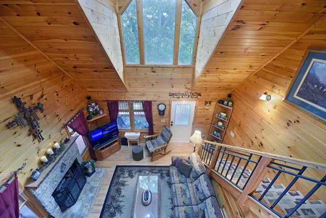 a room with furniture and a flat screen tv