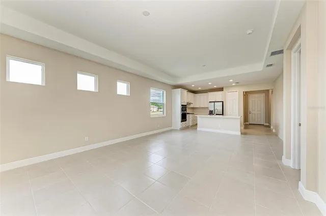 a view of a livingroom with furniture and chandelier