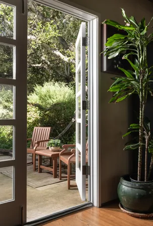 a view of living room with furniture and garden
