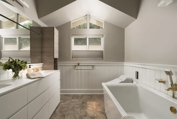 a bathroom with a sink and a bathtub