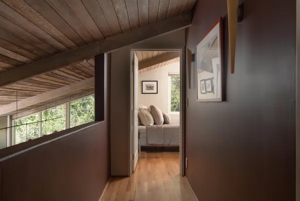 a view of a balcony and wooden floor