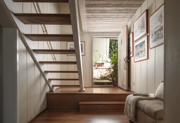 a room with furniture and a window