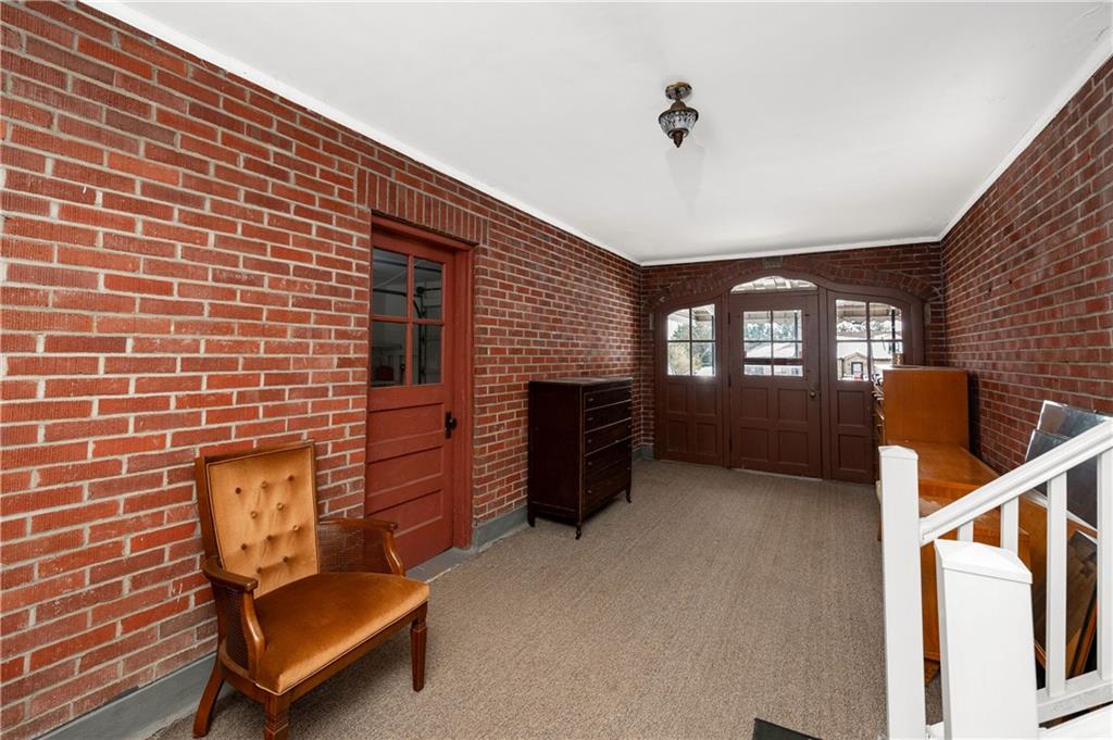 125 Merritt Drive Butler, PA 16001 - Photo 20 of 21 Breezeway Transitioning Between House and Garage