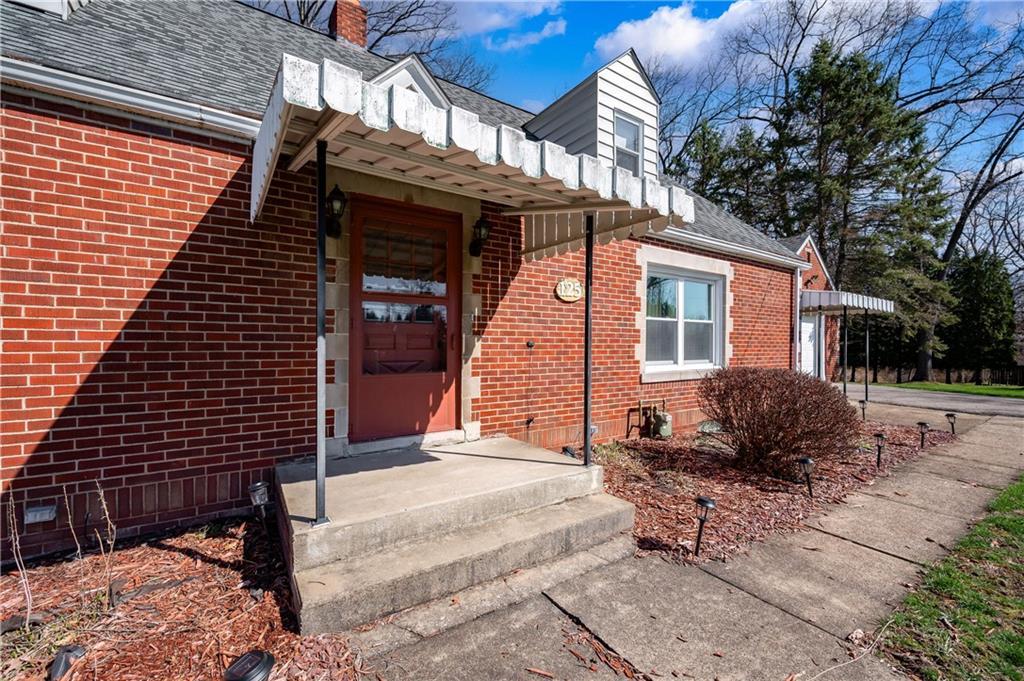 125 Merritt Drive Butler, PA 16001 - Photo 26 of 38 a backyard of a house with seating space
