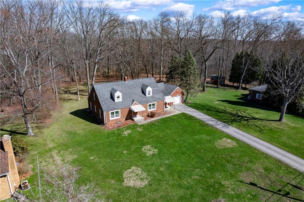 125 Merritt Drive Butler, PA 16001 - Photo 29 of 38 a backyard of a house with table and chairs