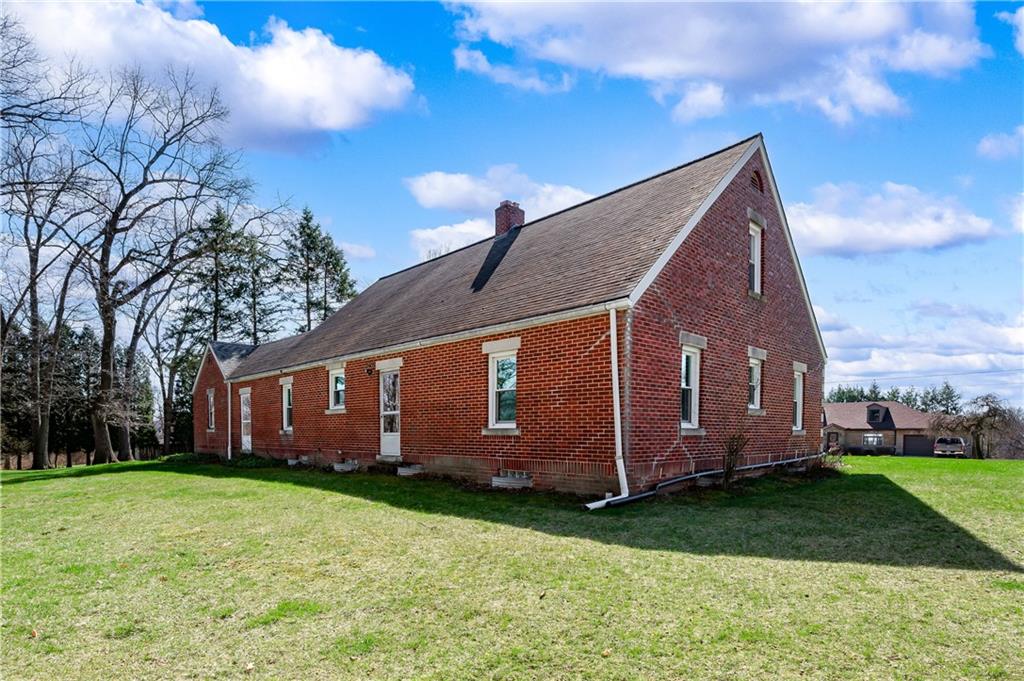 125 Merritt Drive Butler, PA 16001 - Photo 34 of 38 a view of a house with a yard