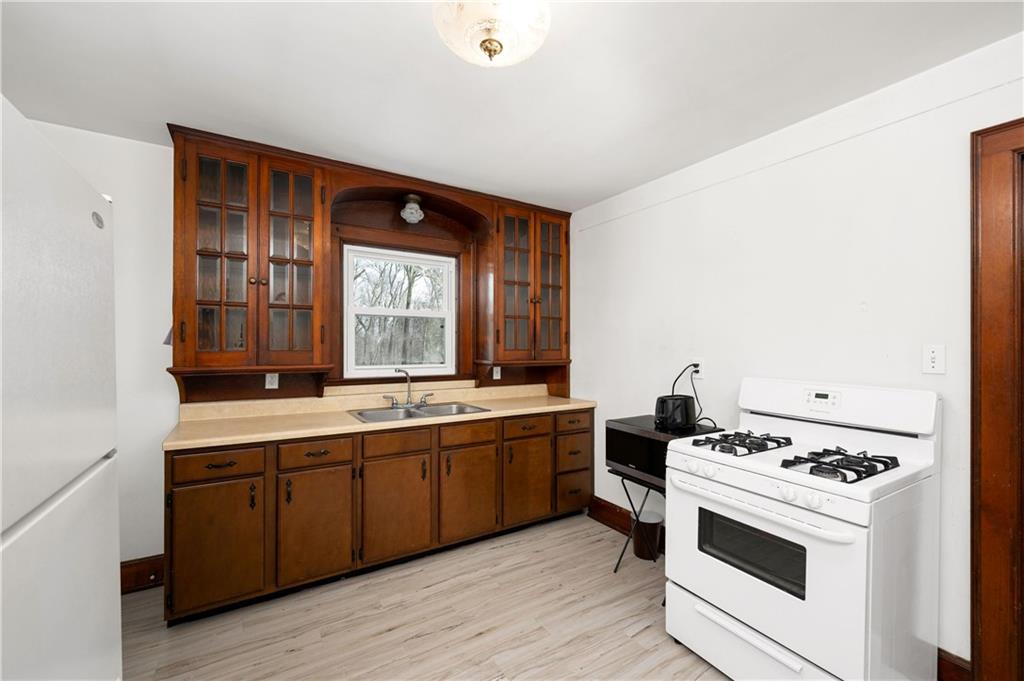 125 Merritt Drive Butler, PA 16001 - Photo 10 of 38 a kitchen with a stove and a sink