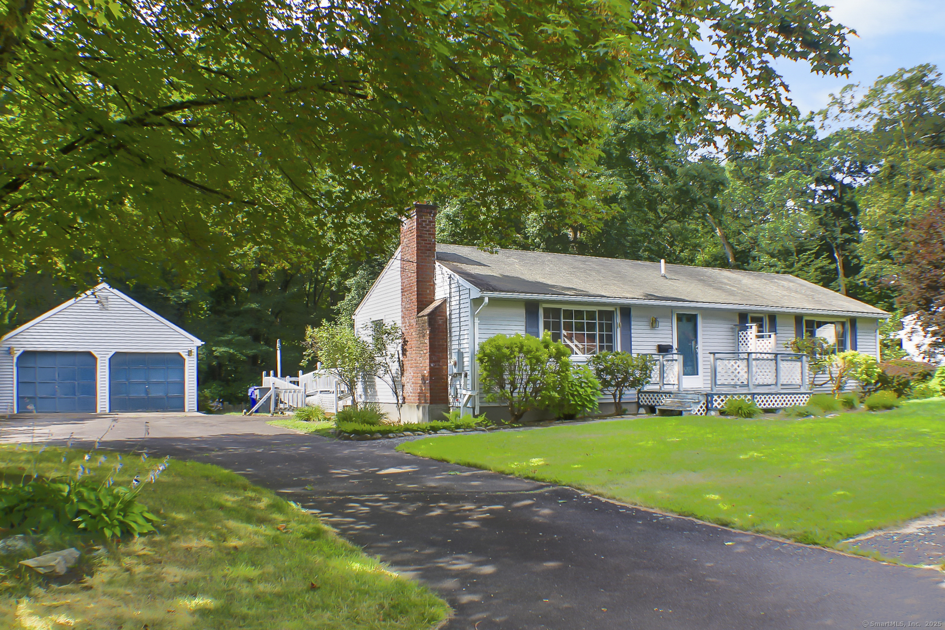 52 Field Road Enfield, CT 06082 - Photo 1 of 1 a front view of a house with garden
