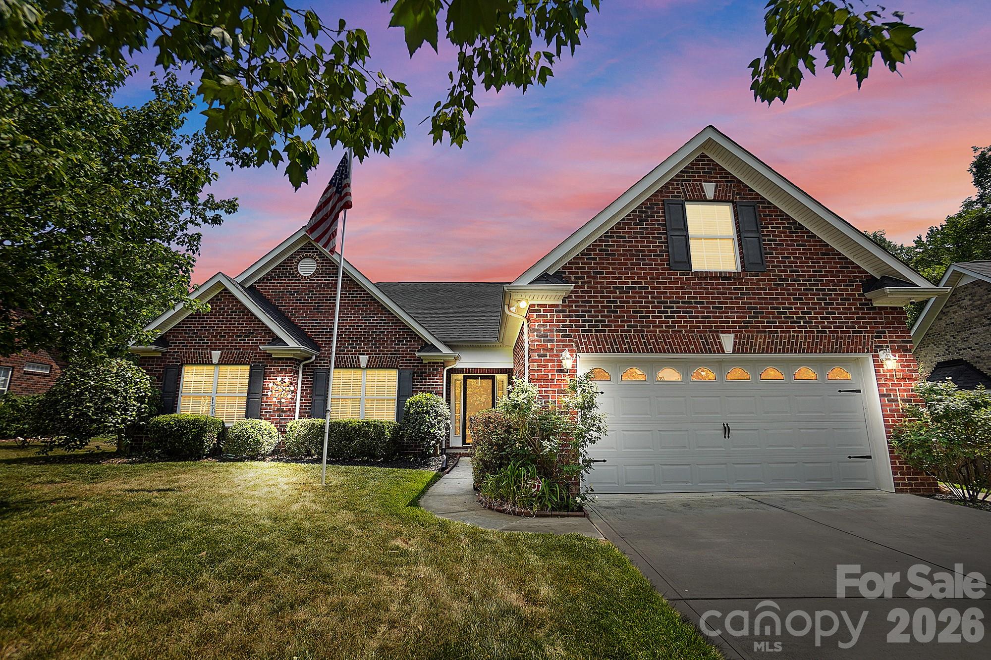 3324 Muddy Creek Road Midland, NC 28107 - Photo 1 of 46 a front view of a house with a yard