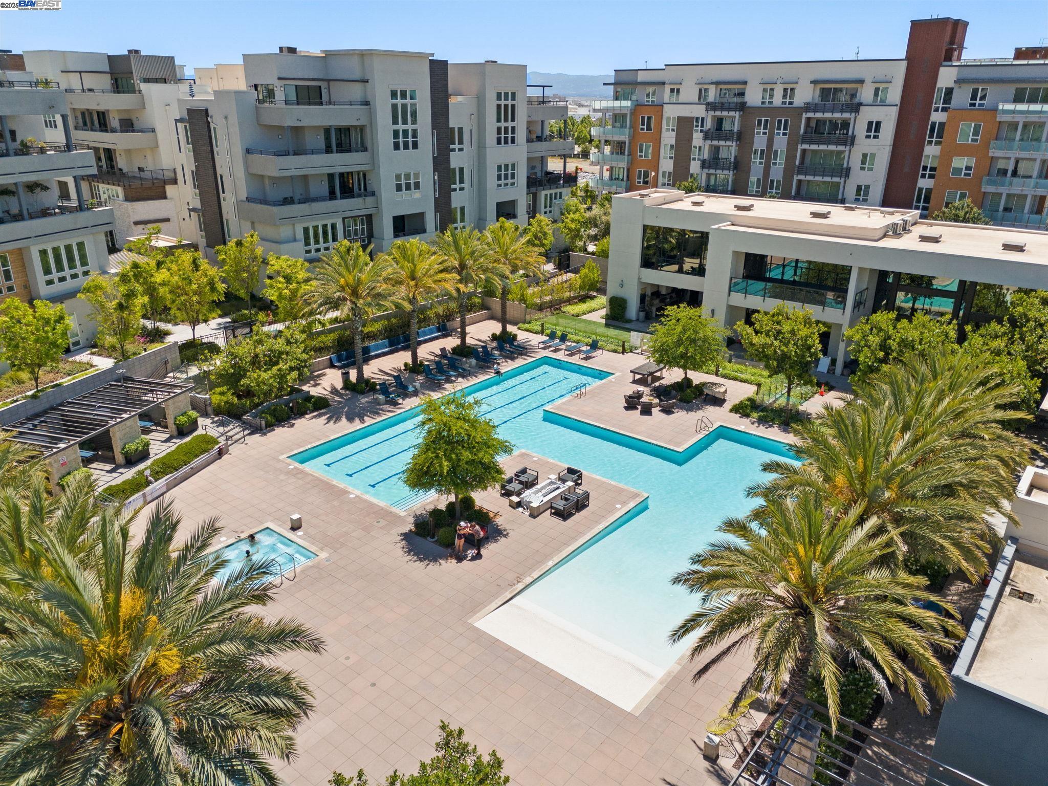 45128 Warm Springs Boulevard, Unit 105 Fremont, CA 94539 - Photo 8 of 11 a view of building with yard