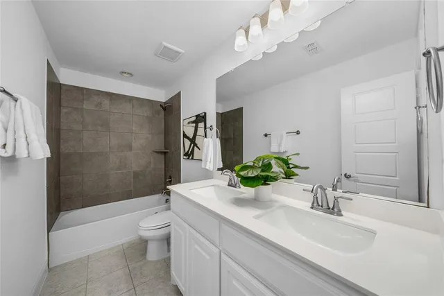 a view of storage and utility room with washer and dryer