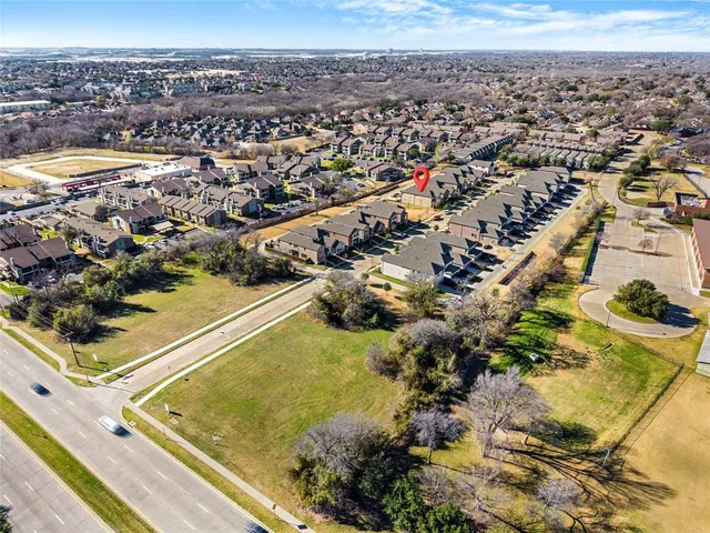 a view of a terrace with couches and sky view