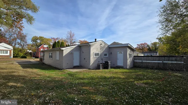 a view of a house with a back yard