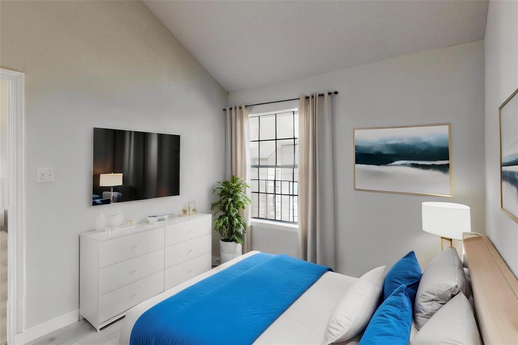 6108 Abrams Road, Unit 328 Dallas, TX 75231 - Photo 4 of 7 a living room with furniture and a flat screen tv