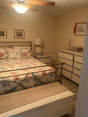 a bedroom with a bed and a cabinets