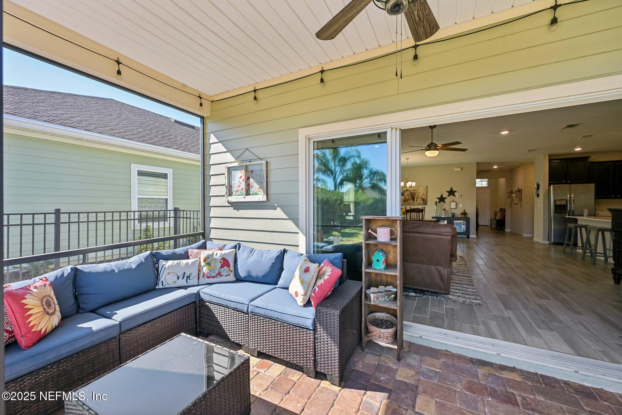 60 Cloverly Point St. Augustine, FL 32092 - Photo 34 of 44 a living room with furniture and a wooden floor