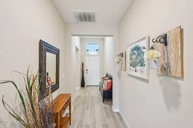 a view of a livingroom with furniture and furniture