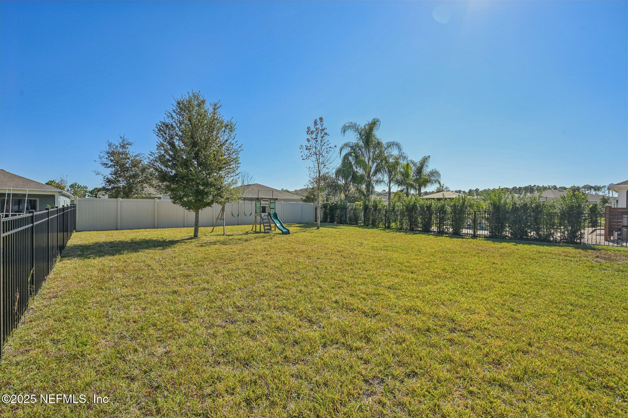 60 Cloverly Point St. Augustine, FL 32092 - Photo 43 of 44 a backyard of a house