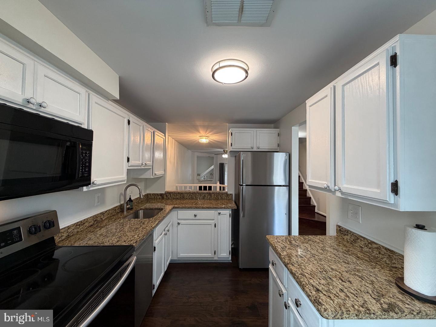 2121 Whisper Way Reston, VA 20191 - Photo 7 of 68 Modern kitchen with sleek finishes.