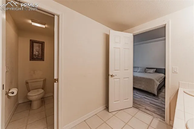 a view of a house with backyard porch and sitting area