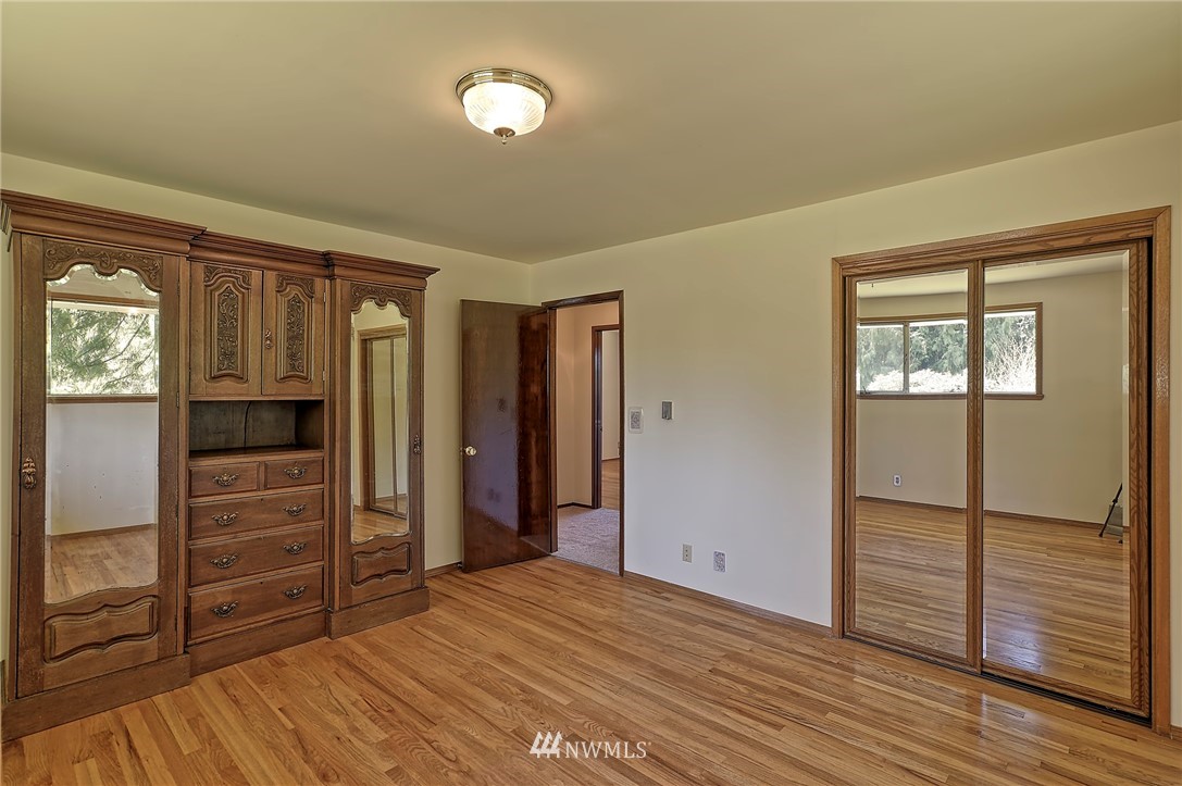 18611 North Road Bothell, WA 98012 - Photo 17 of 38 wooden floor and closet in a room