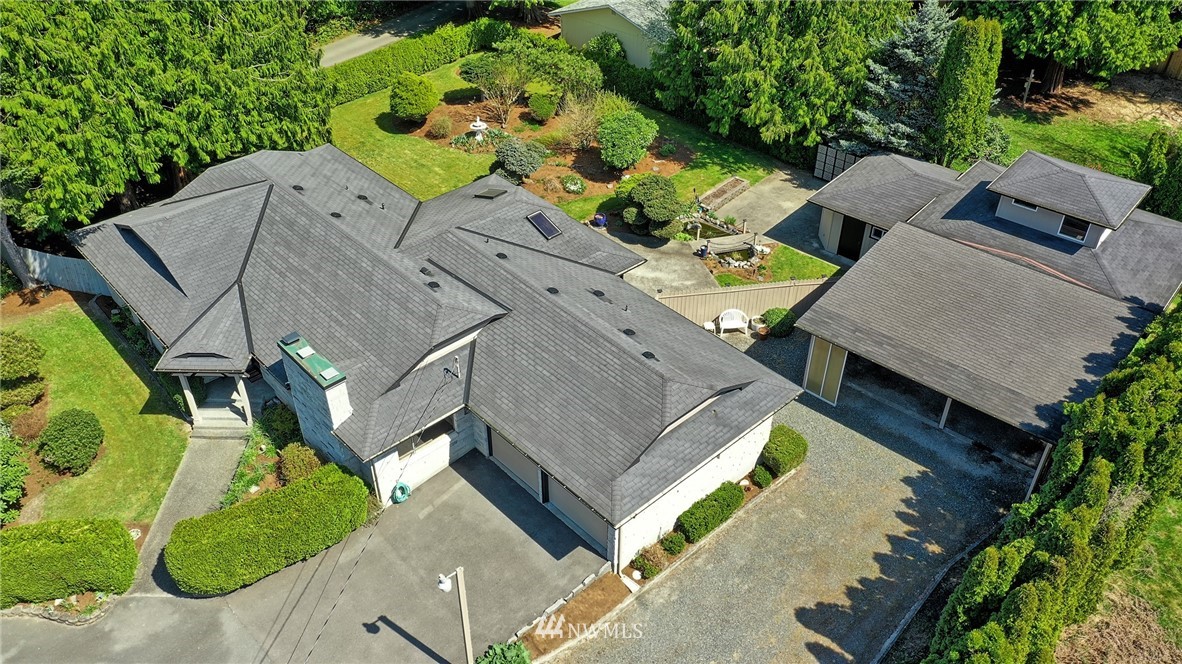 18611 North Road Bothell, WA 98012 - Photo 3 of 38 an aerial view of a house with a yard basket ball court and outdoor seating