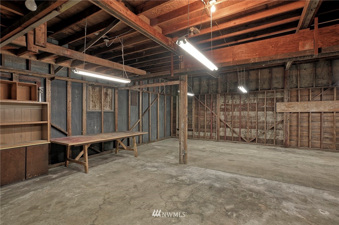 18611 North Road Bothell, WA 98012 - Photo 31 of 38 a view of an empty room with wooden walls
