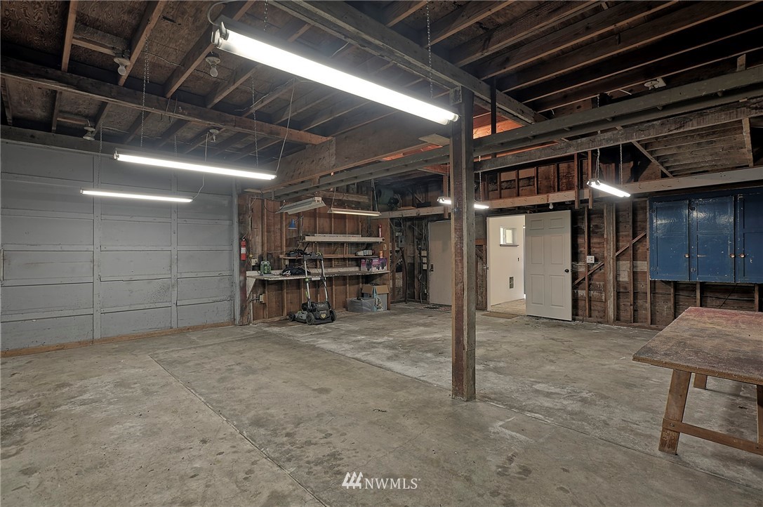 18611 North Road Bothell, WA 98012 - Photo 32 of 38 a view of empty room with wooden ceiling
