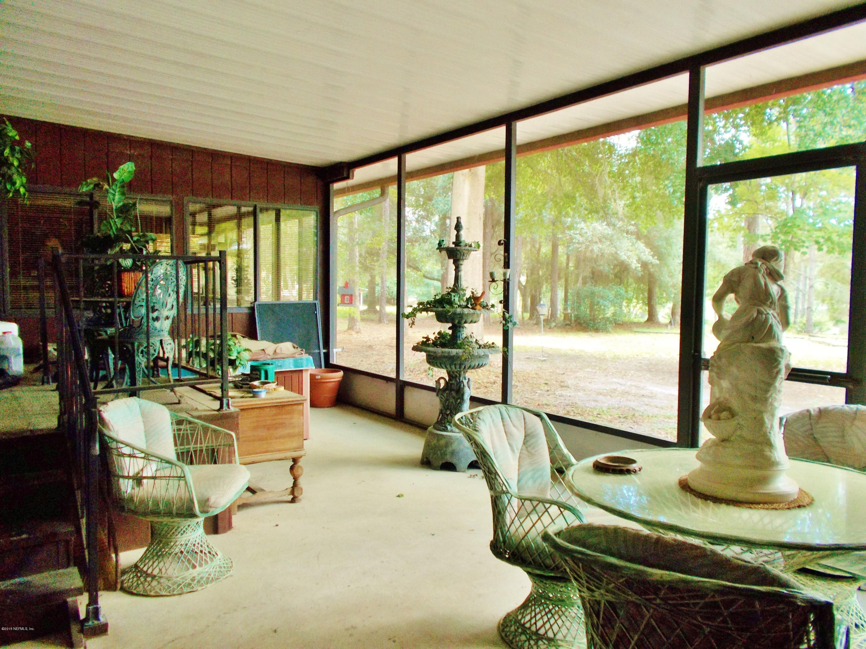 113 Palmetto Road Georgetown, FL 32139 - Photo 16 of 45 Screened porch view 2