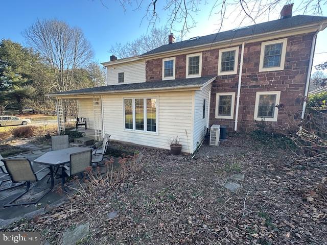 1290 Golf Course Road Birdsboro, PA 19508 - Photo 30 of 35 a backyard of a house with yard and outdoor seating