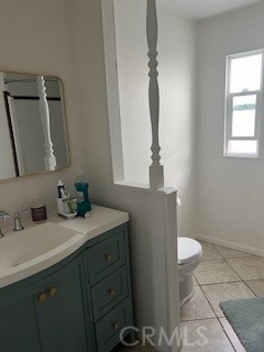 20600 South Main Street, Unit 23 Carson, CA 90745 - Photo 14 of 18 a bathroom with a sink toilet and mirror