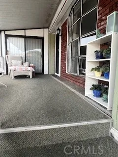 a view of a livingroom with a large window