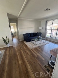 20600 South Main Street, Unit 23 Carson, CA 90745 - Photo 6 of 18 a living room with furniture and wooden floor