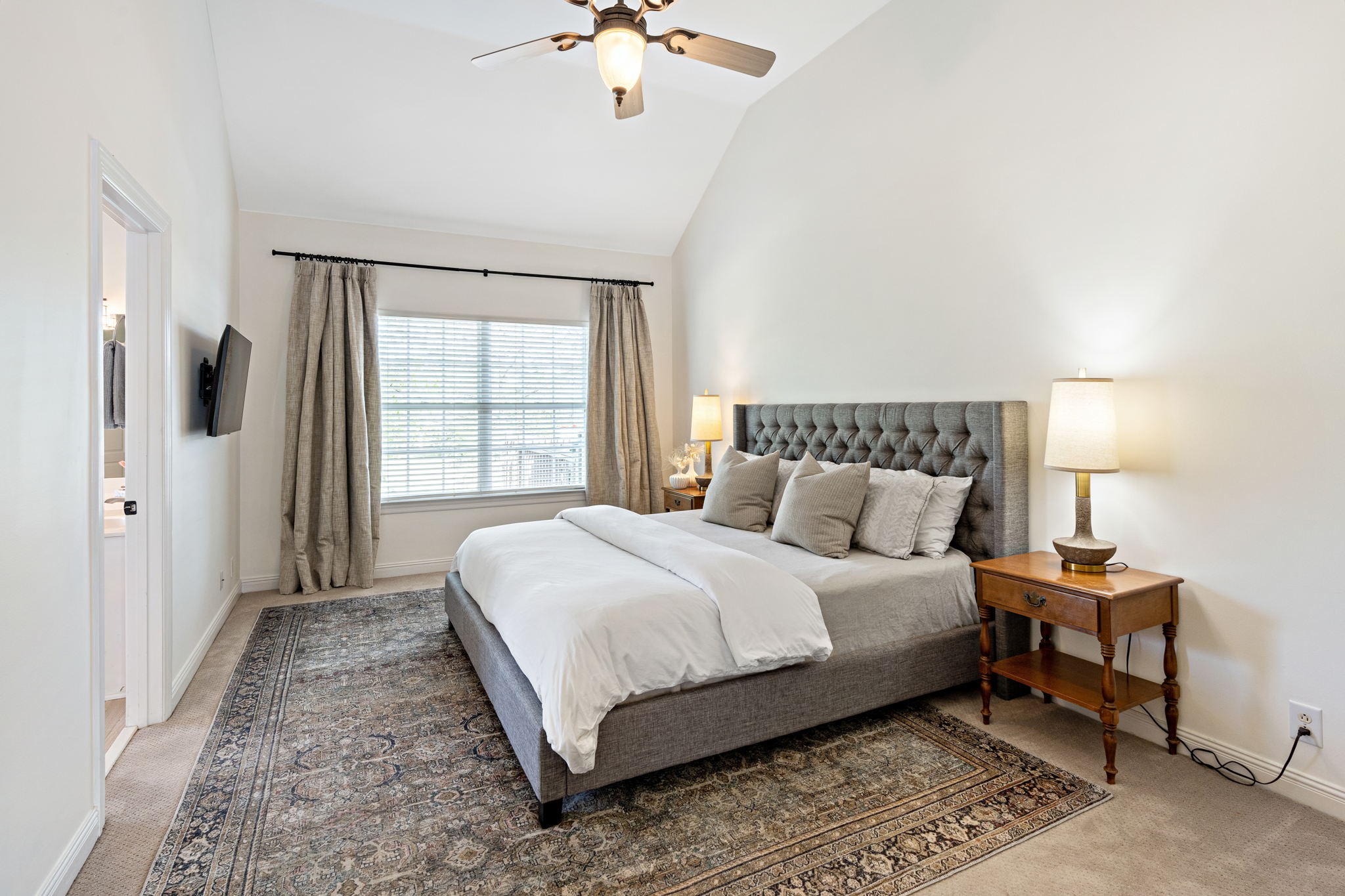 3156 Vera Valley Road Franklin, TN 37064 - Photo 12 of 44 a bedroom with a bed lamp and a window