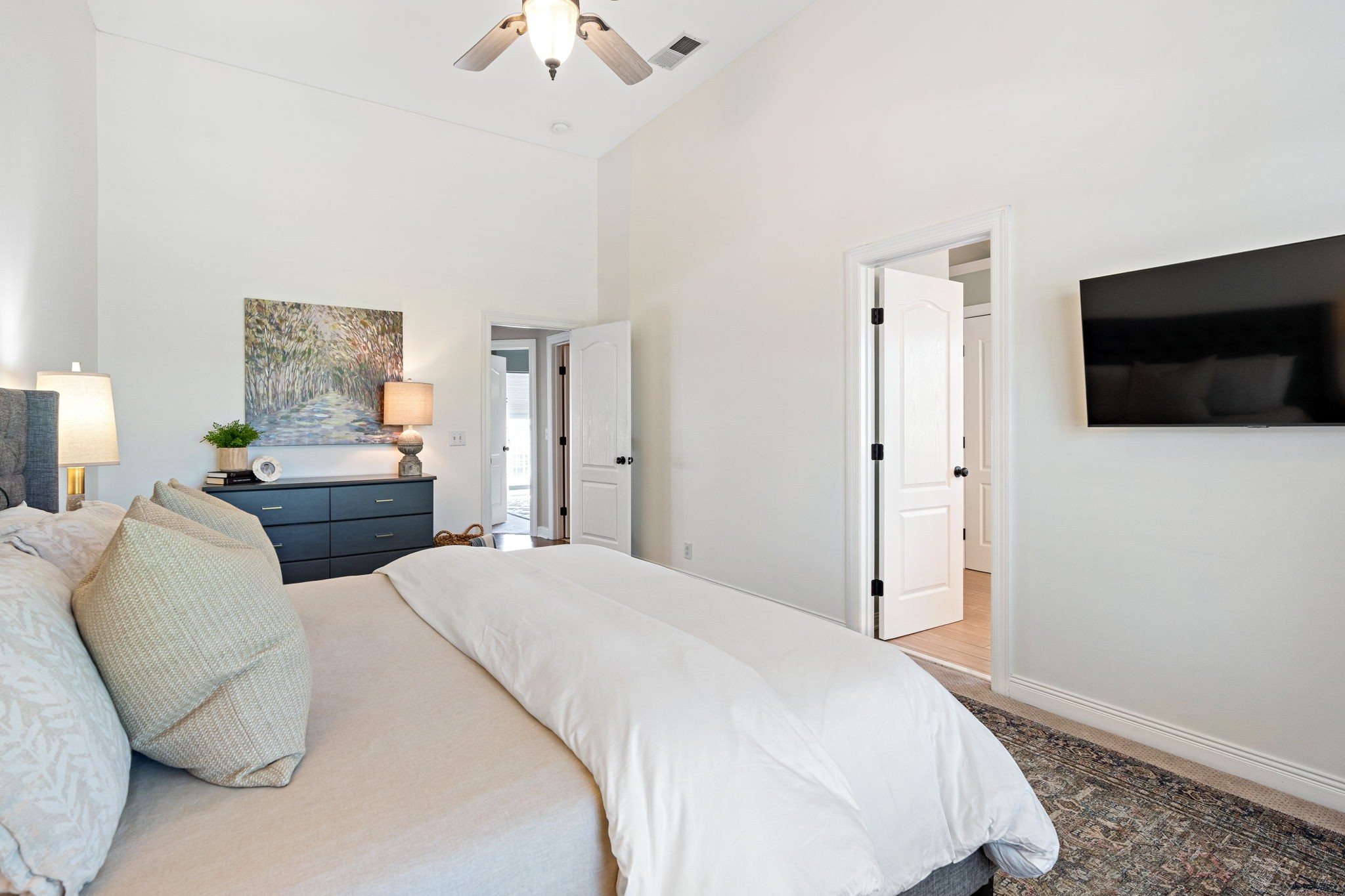 3156 Vera Valley Road Franklin, TN 37064 - Photo 13 of 44 a bedroom with a bed and a flat screen tv
