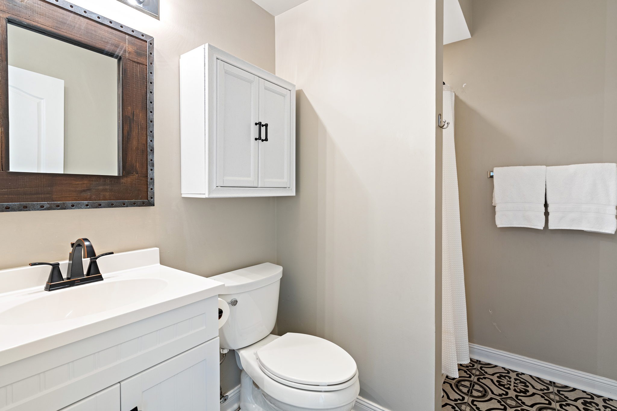 3156 Vera Valley Road Franklin, TN 37064 - Photo 28 of 44 a bathroom with a sink a toilet and mirror