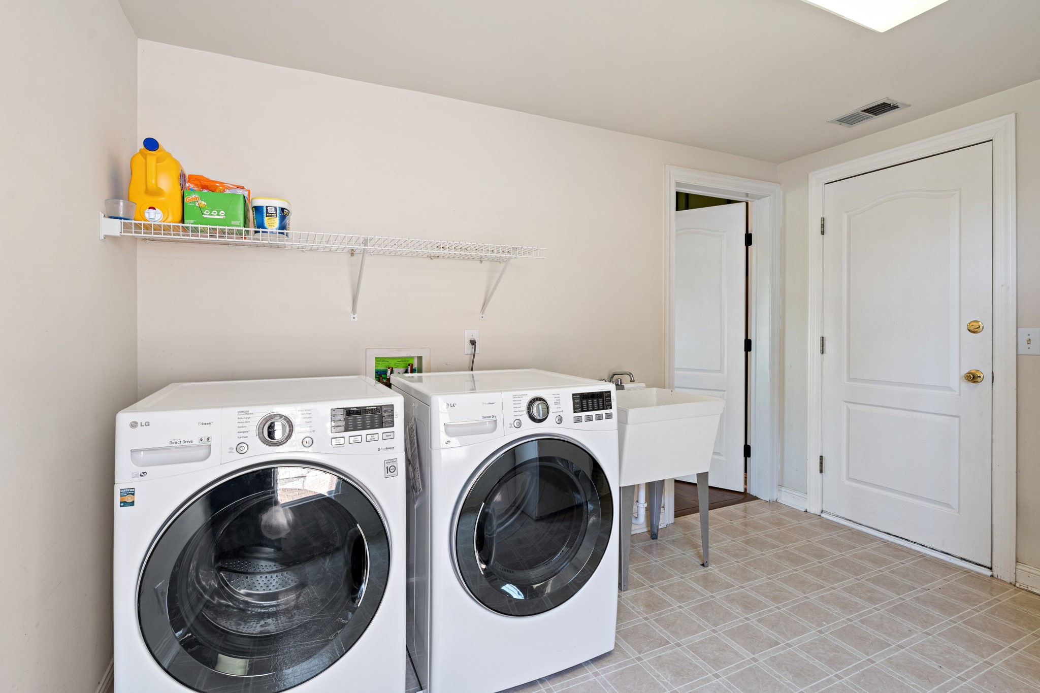 3156 Vera Valley Road Franklin, TN 37064 - Photo 31 of 44 a utility room with dryer and washer