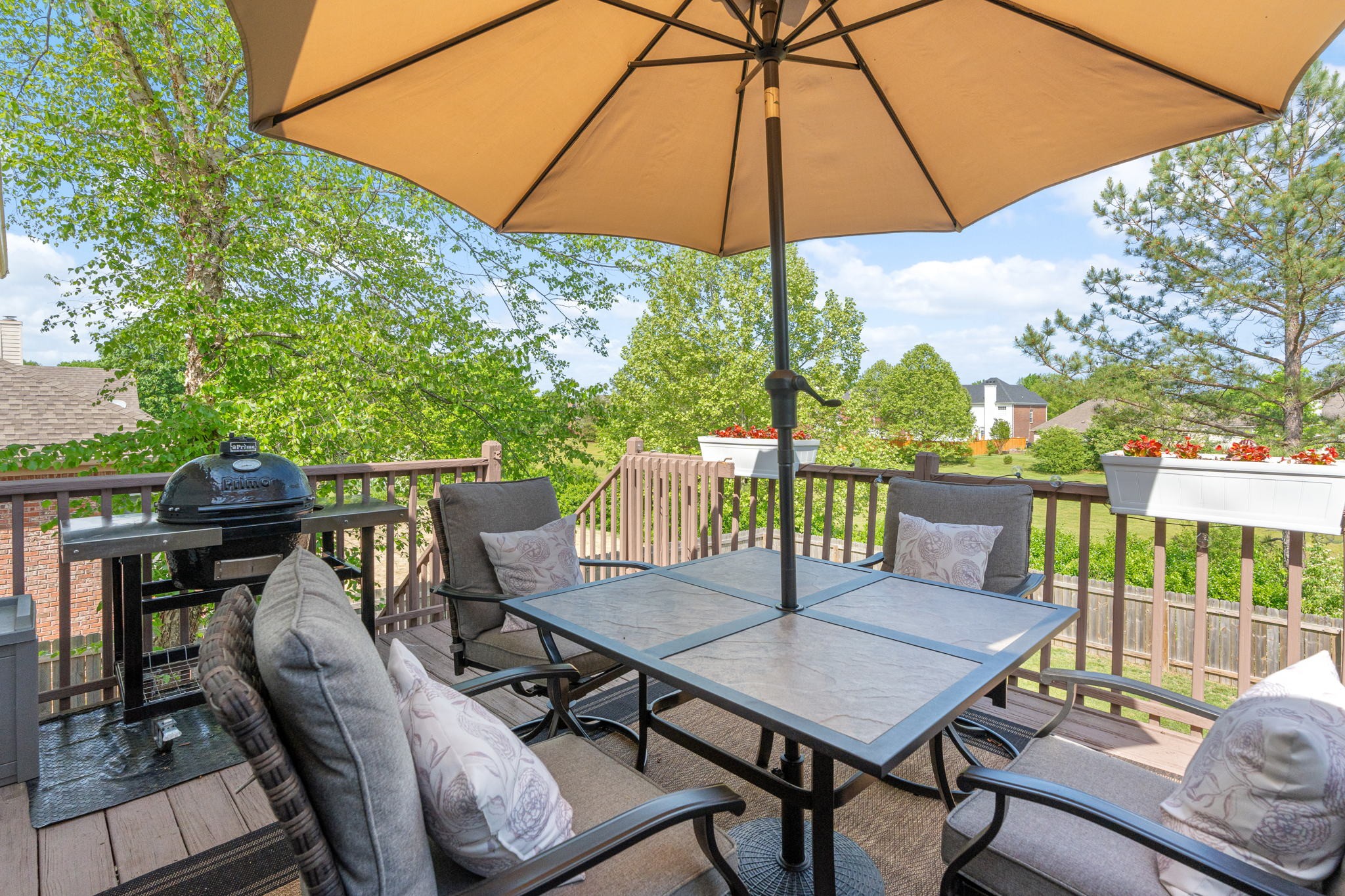 3156 Vera Valley Road Franklin, TN 37064 - Photo 32 of 44 a view of a balcony with furniture and umbrella