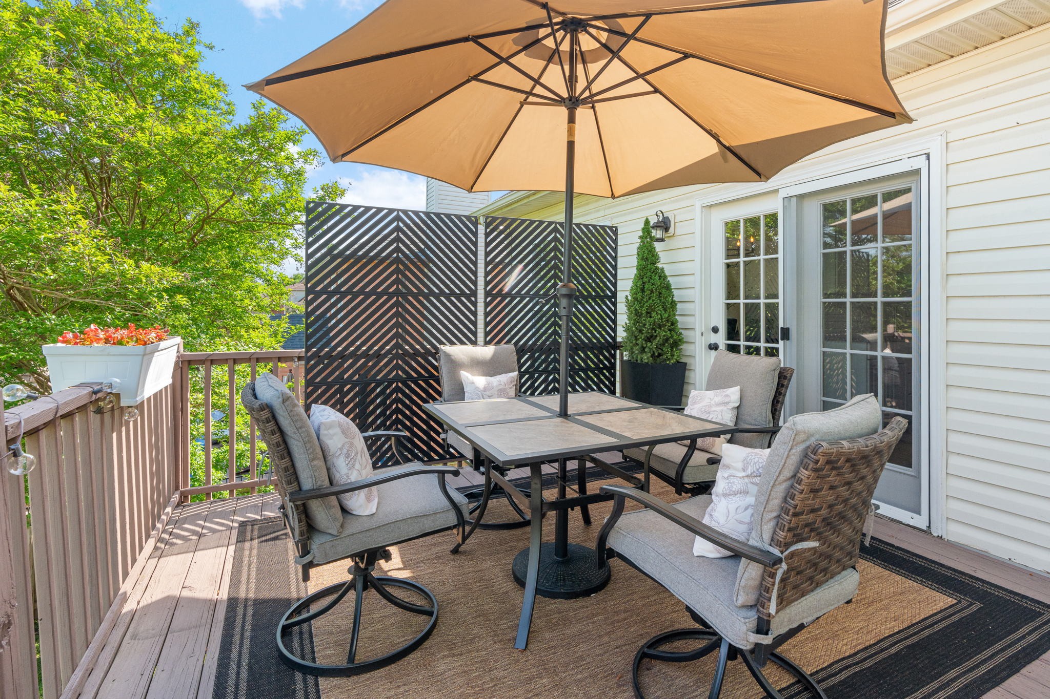 3156 Vera Valley Road Franklin, TN 37064 - Photo 33 of 44 a view of a patio with a table and chairs under an umbrella