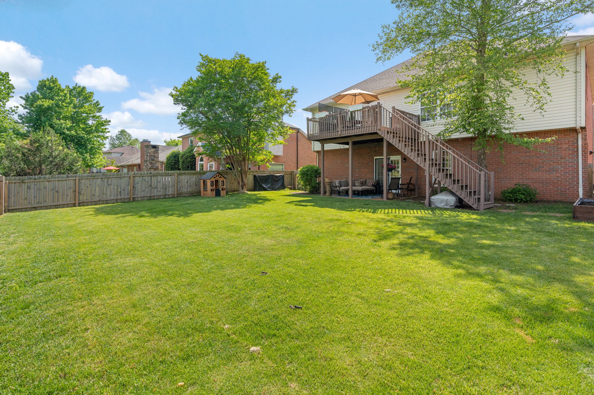 3156 Vera Valley Road Franklin, TN 37064 - Photo 37 of 44 a view of a house with a yard and sitting area