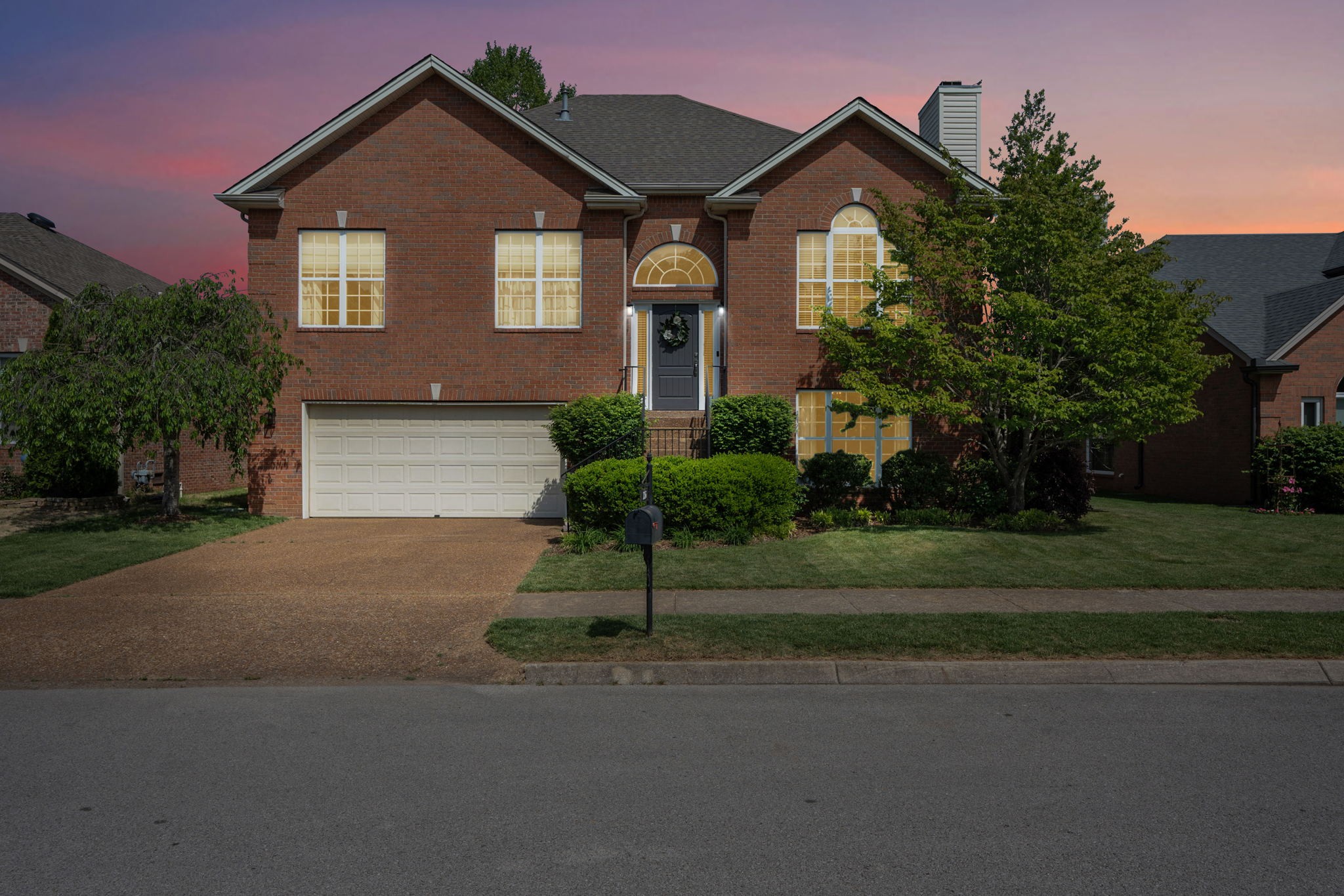 3156 Vera Valley Road Franklin, TN 37064 - Photo 44 of 44 a front view of a house with a yard and garage