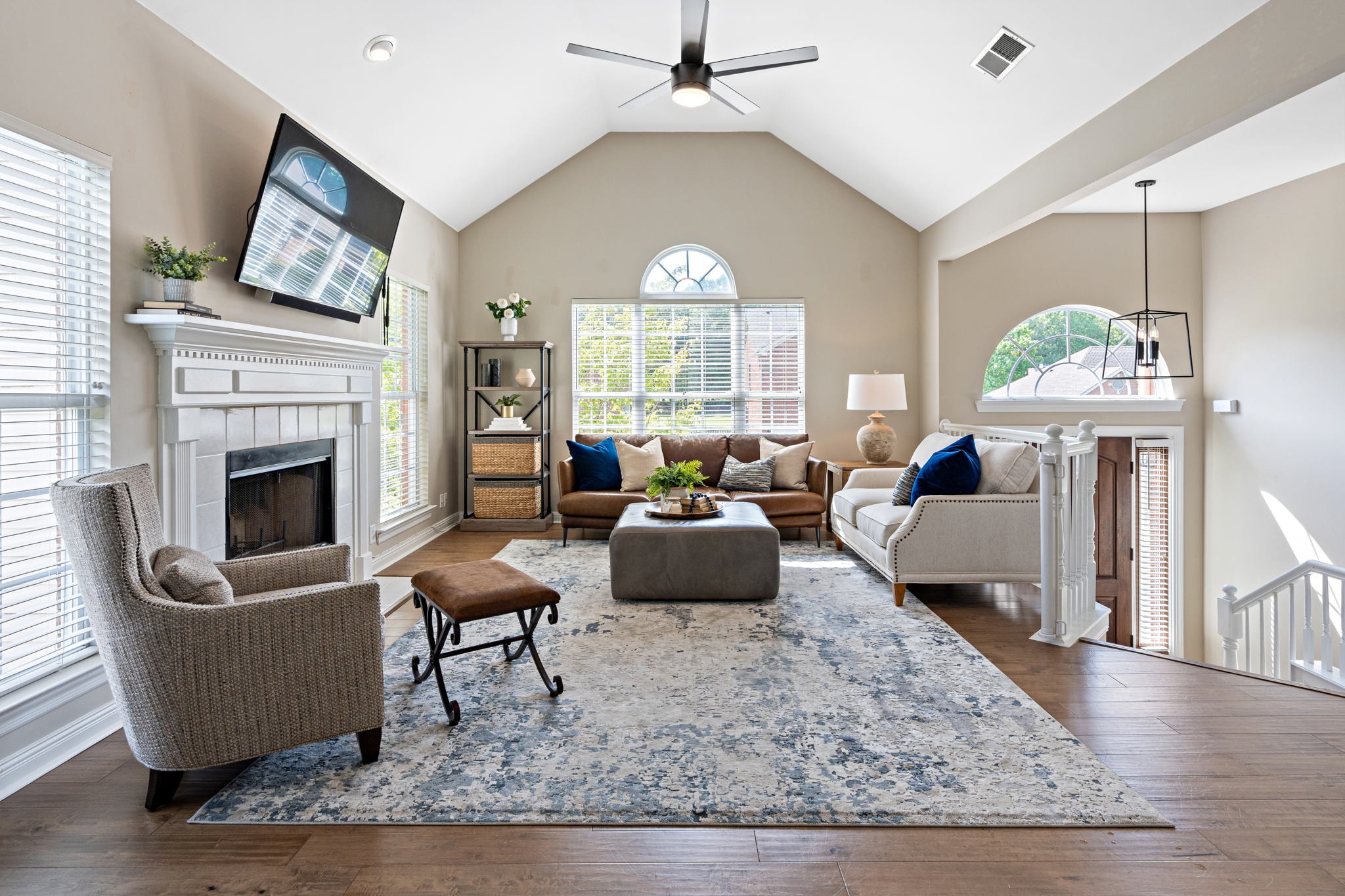 3156 Vera Valley Road Franklin, TN 37064 - Photo 5 of 44 a living room with furniture a fireplace and a large window