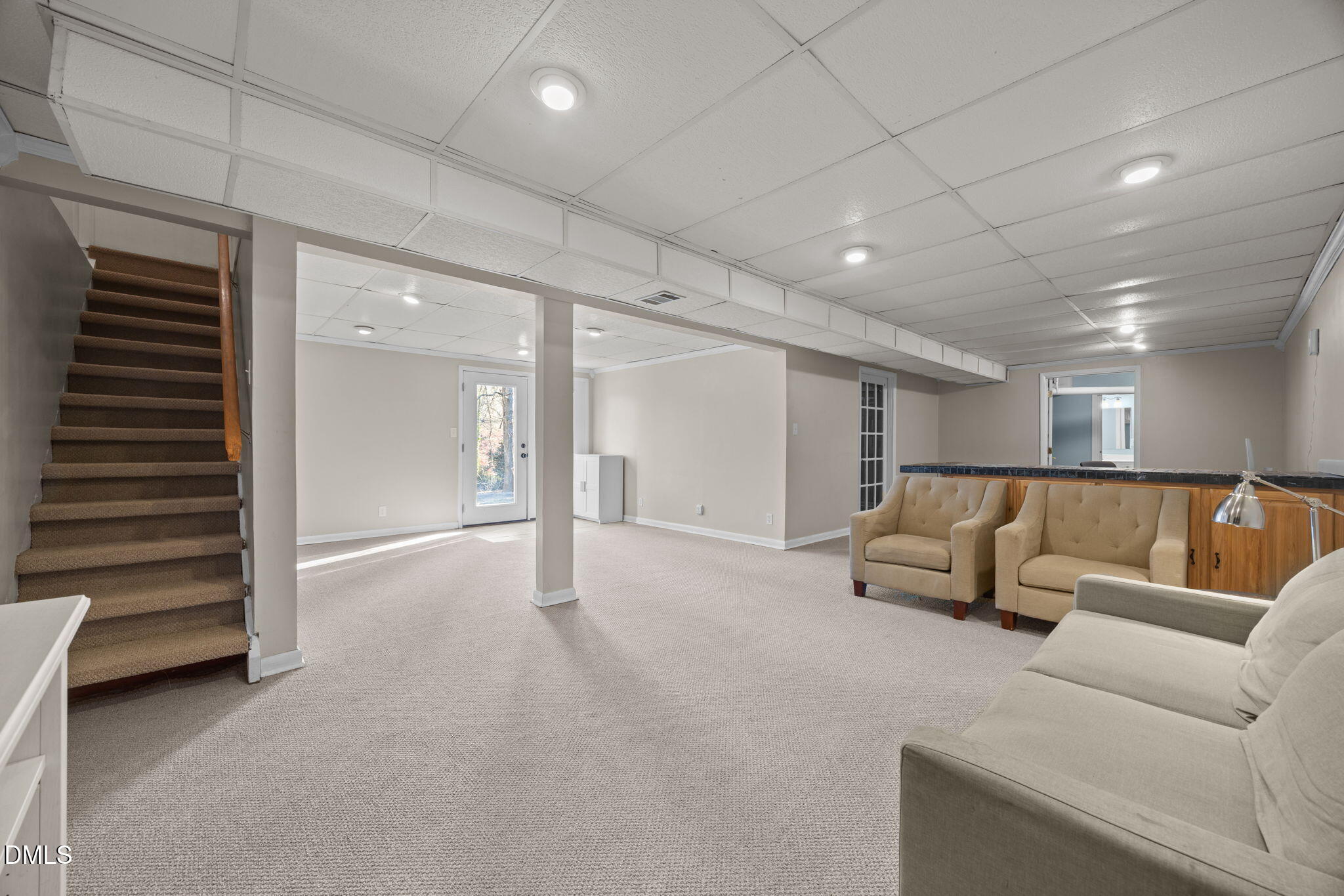 4828 Latimer Road Raleigh, NC 27609 - Photo 22 of 47 a living room with furniture and a ceiling fan